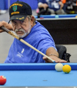 Veteran shooting pool